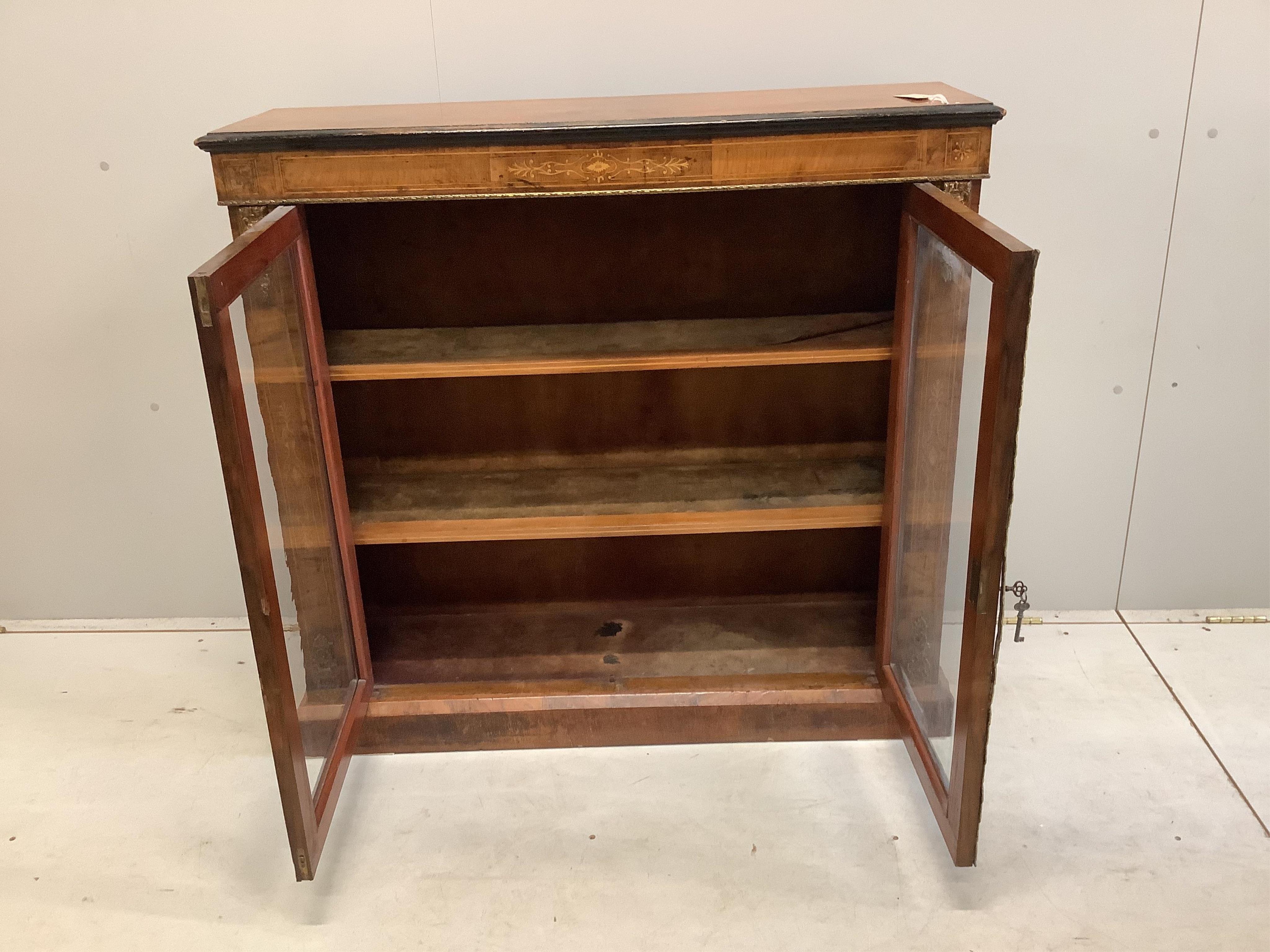 A late Victorian gilt metal mounted inlaid walnut pier cabinet, width 106cm, depth 31cm, height 99cm. Condition - fair